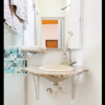 Banheiro Suíte Guaia - A Toca da Garoupa - Prainha Branca, SP, Brasil